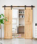 7FT Double Sliding Barn Door Hardware Kit for Two 21 Inch Door Panels installed in modern living space, doors excluded