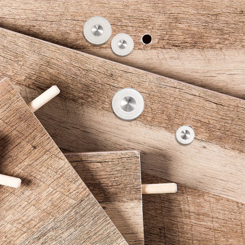 Wood panels with dowels and Dowel And Tenon Center Transfer Plugs For Dowel Centers And Doweling Pins Twenty Piece Drill Hole Tool Set.