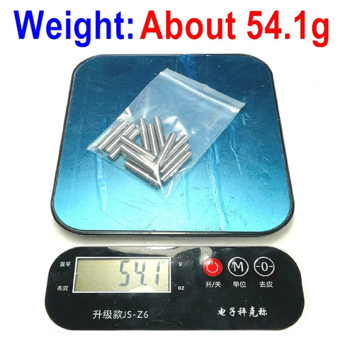 Heavy Duty 3/16 Inch By 1 Inch Dowel Pins 15 Pack on scale showing weight of 54.1g