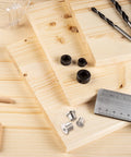Dowel And Tenon Center Transfer Plugs For Dowel Centers And Doweling Pins Twenty Piece Drill Hole Tool Set on wood with ruler