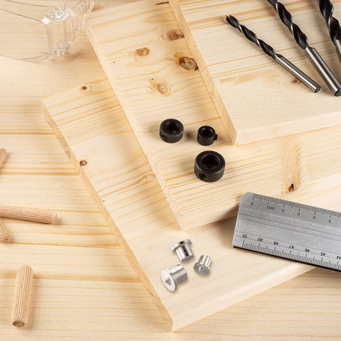 Dowel And Tenon Center Transfer Plugs For Dowel Centers And Doweling Pins Twenty Piece Drill Hole Tool Set on wood with ruler
