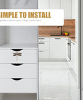 Dragonfly Cabinet Knobs Vintage Brass Finish Decorative Drawer Pulls installed on white drawer in modern kitchen setting