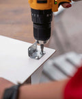 Drill fixing a metal bracket with bolts on a board, using 113 Piece Bolts Nuts And Washers Assortment Kit Galvanized Iron Hardware Set For Home Repair.