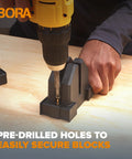 Parallel Clamp Block Set For Woodworking 4 Pack With Dual Channel Design being installed with a drill on wooden surface