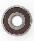 Close-up of Drive End Alternator Bearing For Legacy 1990 To 1994 Models PC 407371 OE Replacement, metallic with brown accents