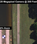 Aerial view of a Bulls Eye 24x24 Drone Ground Control Point Targets Six Pack For Mapping And Surveying in a field with black and white markers.