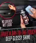 Person using VRP Vinyl Rubber And Plastic Dressing For Tires Trim And Surfaces Delivers A Non Greasy Dry To The Touch Shine on dashboard