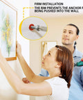 Man and woman installing frame with 208PCS Drywall Anchors and Screws Assortment Kit, using Phillips pan head screws for firm wall grip