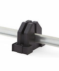 Parallel Clamp Block Set For Woodworking 4 Pack With Dual Channel Design stabilizing a clamp bar, black dual-channel blocks.