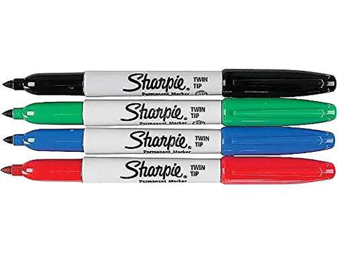 Dual-tip permanent markers in a four-pack deliver precise fine lines and broad strokes in red blue green and black, visible pens.