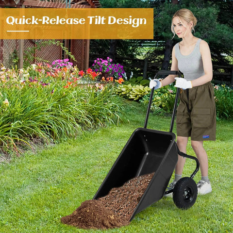 Person using Dual Wheel Wheelbarrow 330 LB Utility Garden Cart with 10 Inch Pneumatic Tires for soil transport in garden.
