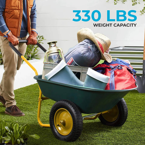 Dual Wheel Home Utility Yard Wheelbarrow Garden Cart with Built In Stand loaded on grass with gardening tools and supplies