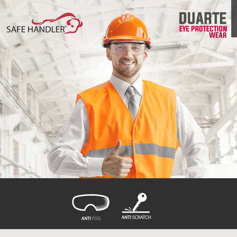 Construction worker wearing Duarte Premium Over Glasses Safety Eyewear With Anti Fog Lenses ANSI Z87.1 and orange safety vest indoors.