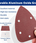 Close-up of Assorted 150Pcs Mouse Sanding Pads 5 Hole Dust Extraction for wood furniture, highlighting aluminum oxide grain.