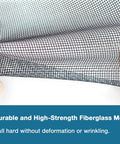 Close-up of hands stretching black adjustable fiberglass window screen mesh kit 48x102 inches showing durability.