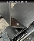 Close-up of 2 Pack E Track Wheel Chocks For Motorcycles And Dirt Bikes, Fits Tires Up To 6 Inches, installed on E-Track system.