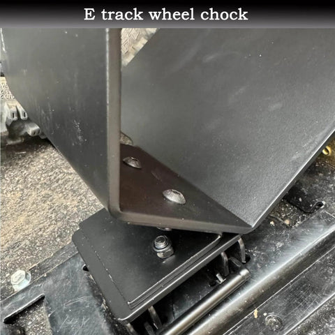 Close-up of 2 Pack E Track Wheel Chocks For Motorcycles And Dirt Bikes, Fits Tires Up To 6 Inches, installed on E-Track system.