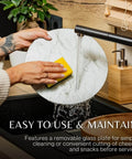 12 inch acacia wood lazy susan turntable with removable glass plate being cleaned under water.