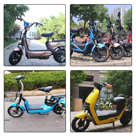 Four electric folding bikes with 14X2.125 tubeless tire and angled valve in various colors displayed outdoors.