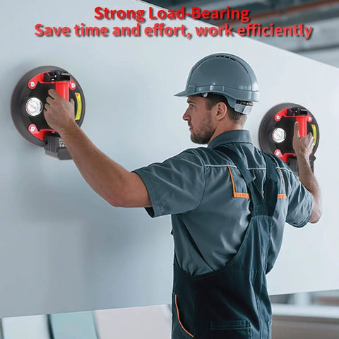 Worker using Glass Suction Cups Electric Vacuum Lifter With One Touch Eight Inch Auto Lift 440 Lbs Heavy Duty Gripper for panel installation.