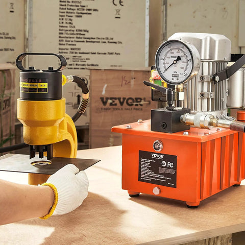 Electric Hydraulic Pump, 10000 PSI 750W 110V, 488 in³/8L Capacity, shown powering a punching machine on a workbench.