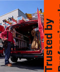Worker with tool bag accessing equipment in red service van, "Trusted by Professionals" text in bold.