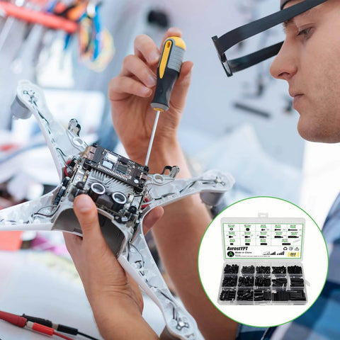 Person assembling a quadcopter using 365 Pieces M2.5 Black Nylon Hex Spacer Standoff Set With Male And Female Spacers Nuts And Screws