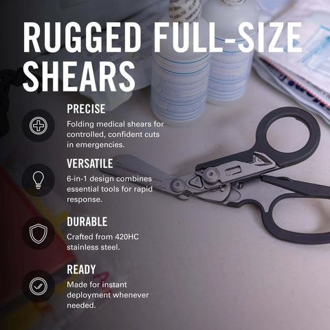 Raptor Rescue 6-in-1 Heavy-Duty Emergency Trauma Shears With Included Utility Holster Made In USA Built For Quick Rescue And Grab-And-Go Everyday Tough Situations Anywhere, shown on a table with medical supplies, demonstrating 6-in-1 design.