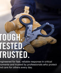 Raptor Rescue 6-in-1 Heavy-Duty Emergency Trauma Shears With Included Utility Holster Made In USA Built For Quick Rescue And Grab-And-Go Everyday Tough Situations Anywhere held by gloved hand