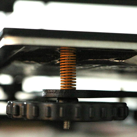 Close-up of Ender 3 Bed Leveling Springs Pack Of 10 By FYSETC 8mm OD 20mm Length Compression Die Springs under 3D printer bed