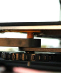 Close-up of yellow compression spring installed in Ender 3 bed assembly, showcasing light load 8mm OD 20mm long die spring pack of 20