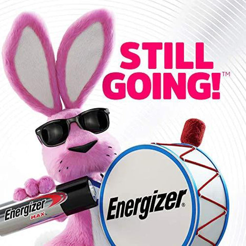 Pink bunny holding drum and battery with 'STILL GOING!' text, representing energy and longevity.