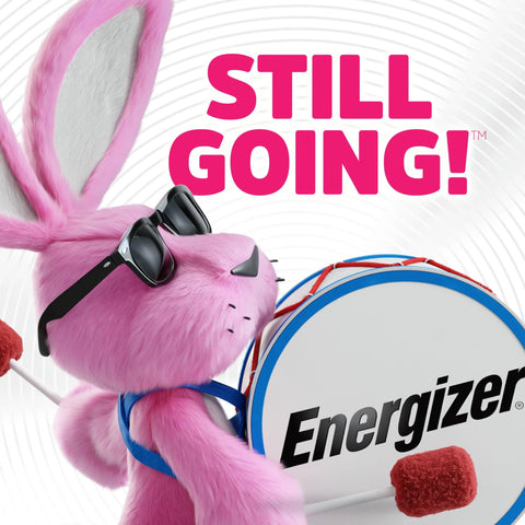 Pink bunny mascot with drum and sunglasses in front of 'Still Going!' text for Alkaline Power AA Batteries 20 Count Pack For Remote, Mouse And Controllers