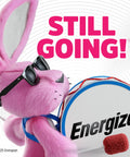 Pink bunny with sunglasses playing drum, promoting battery longevity