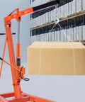 Heavy Duty 8 Ton Hydraulic Long Ram Jack For Engine Hoists With Air Pump And Clevis Base Cylinder lifting a box