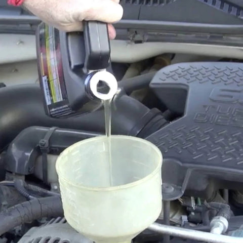 Pouring Heavy Duty Hyper Lubricant Engine Treatment For All Oils And Engines 32 Ounce Bottle Single into car engine