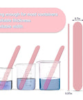 Epoxy Resin Stir Sticks Set 20 PVC Mixing Sticks In 4 Colors shown in various beakers with liquid for resin crafts