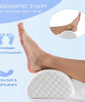 Leg resting on ergonomic foam footrest, designed for foot and heel pain relief, showcasing soft, lightweight support.