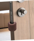 Installed EVA door stopper from 3 Pack EVA Door Clamps And Door Stops For Finger Pinch Guard And Anti Slam Edge Protector, No Tools Required Installation.
