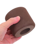 Hand holding a brown EVA door clamp from 3 Pack EVA Door Clamps And Door Stops For Finger Pinch Guard And Anti Slam Edge Protector, No Tools Required Installation, Easy Setup Door Stopper Kit For Home Office Apartment Doors