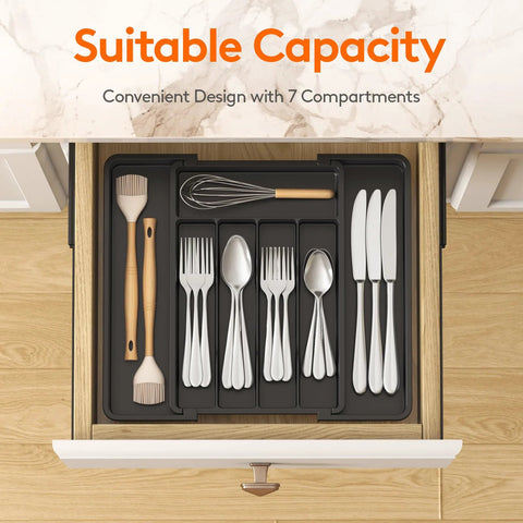 Effortlessly organize kitchen drawers with an expandable silverware organizer that stretches from 8.5 to 14 inches, featuring adjustable compartments for forks, spoons, and knives, BPA-free plastic, keeping flatware neatly separated and easy to reach.