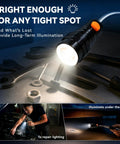Extendable Magnetic Flashlight with Telescoping Magnet Pickup Tool illuminating tools in dark workspace