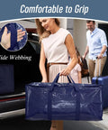 Woman carrying Six Pack Extra Heavy Duty Large Moving Bags with strong zipper and comfortable handles, 23 gallon capacity.