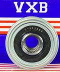 Close-up of F-553099 Alternator Freewheel Clutch Pulley Bearing with visible part number, in front of VXB packaging.