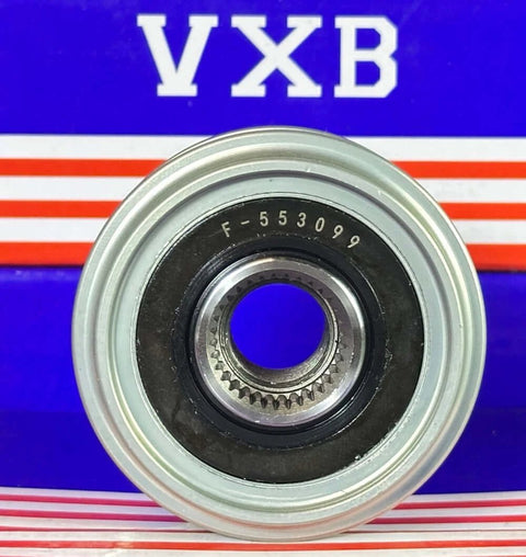 Close-up of F-553099 Alternator Freewheel Clutch Pulley Bearing with visible part number, in front of VXB packaging.