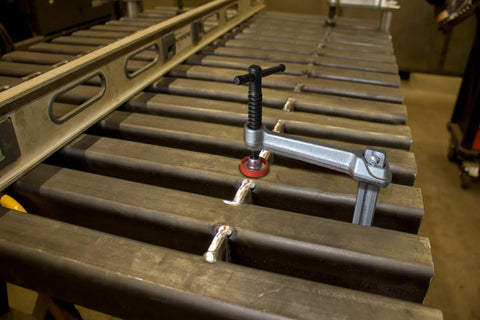 Heavy Duty 12 Inch Bar Clamp Set Four Pack Drop Forged Steel F Clamps With 600 Lb Load Capacity And 3-5/32 Inch Throat On Welding Table