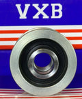 Front view of F‑239808 Alternator Freewheel Clutch Pulley 7 Groove, 17 mm Bore 535014010 with VXB packaging in background