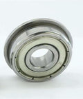 F6803ZZ Flanged Shielded Ball Bearing 17x26x5mm Chrome Steel, front view, showing built-in flange on metal surface