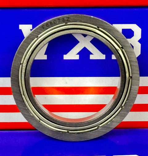 F6807ZZ Thin Section Flanged Ball Bearing 35x47x7mm, chrome steel, front view with metal shields, displayed against colorful box.
