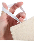 Hand holding soft, tool-free door silencers cushion every slam, preventing accidental lockouts with quiet, no-hole installation